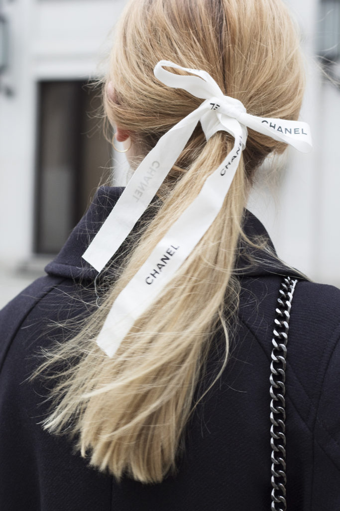 Girl with Chanel ribbon in the hair