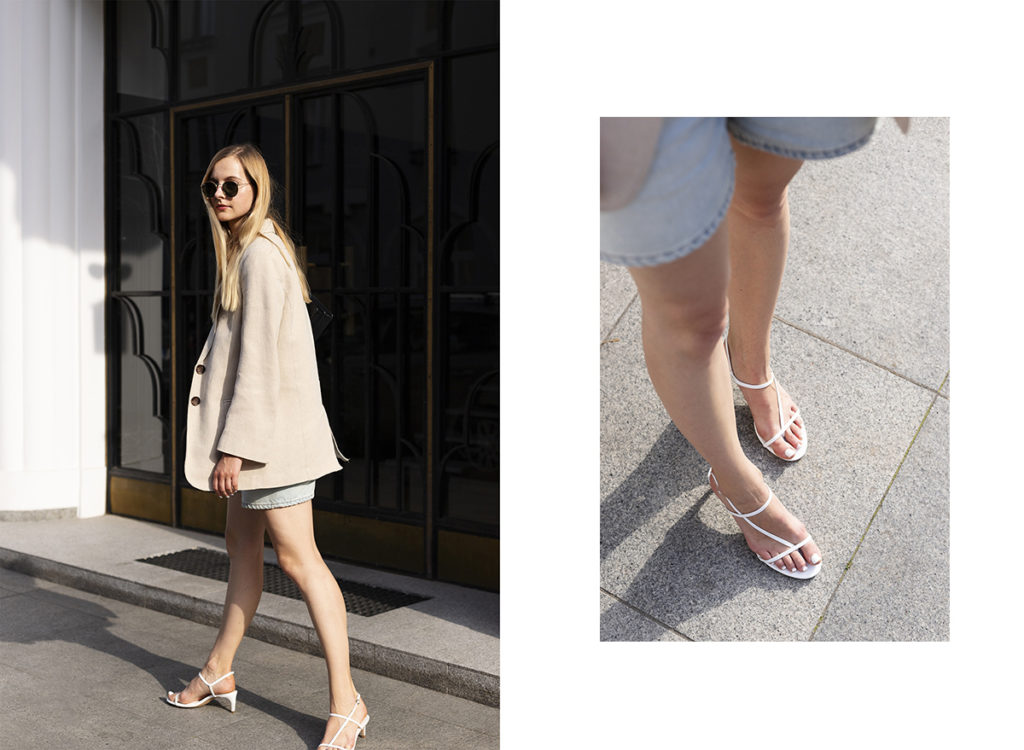 Girl in Mango strappy sandals, Acne Studios shorts and linen blazer