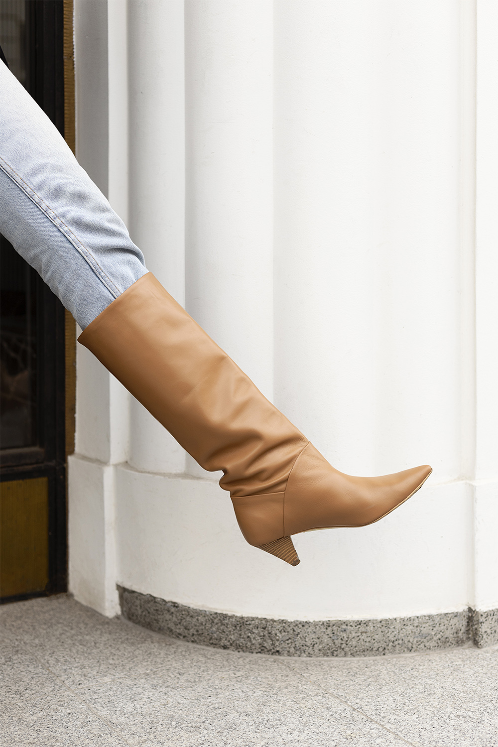 Street style fall look in beige turtleneck and caramel boots